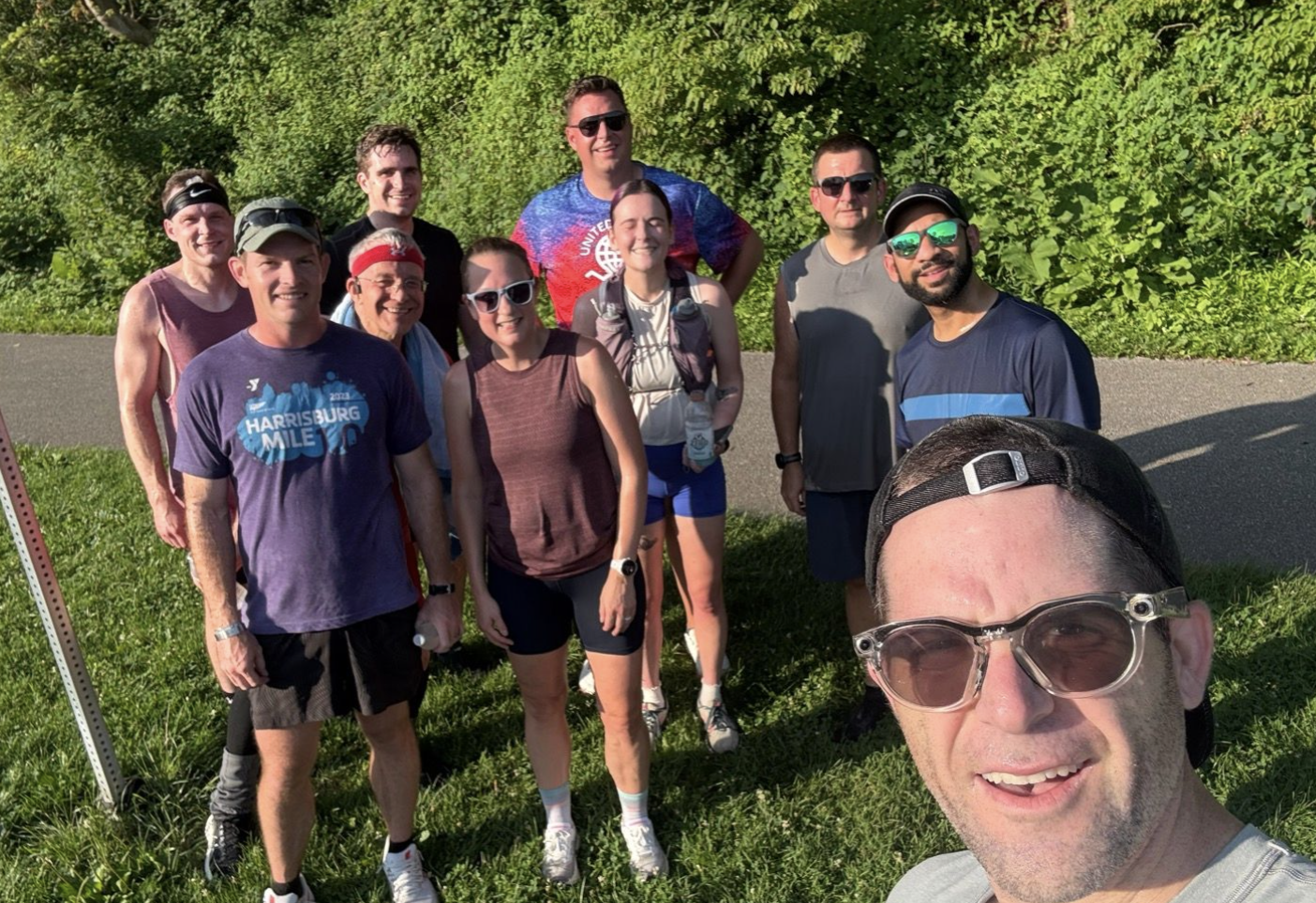 GRYT crew smiling together on the trail after a Saturday run
